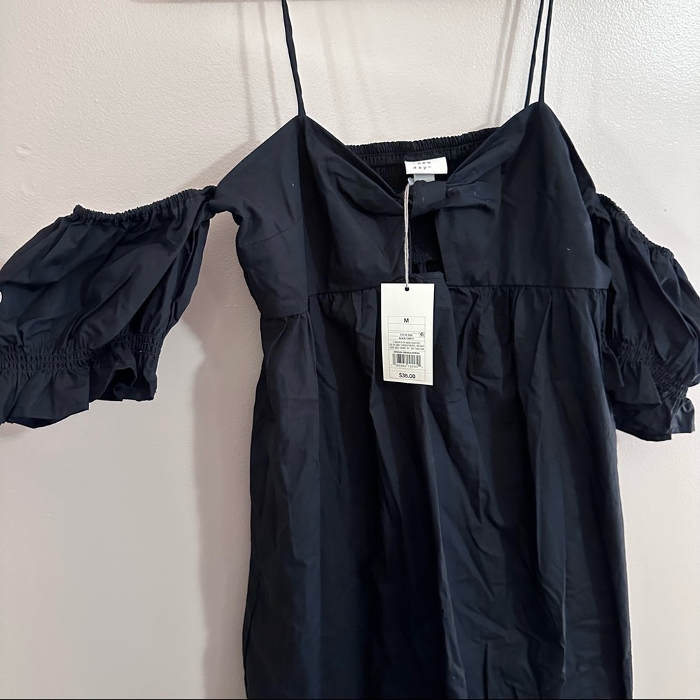 A New Day black midi dress. Thin strap with off the shoulder puffy sleeves.